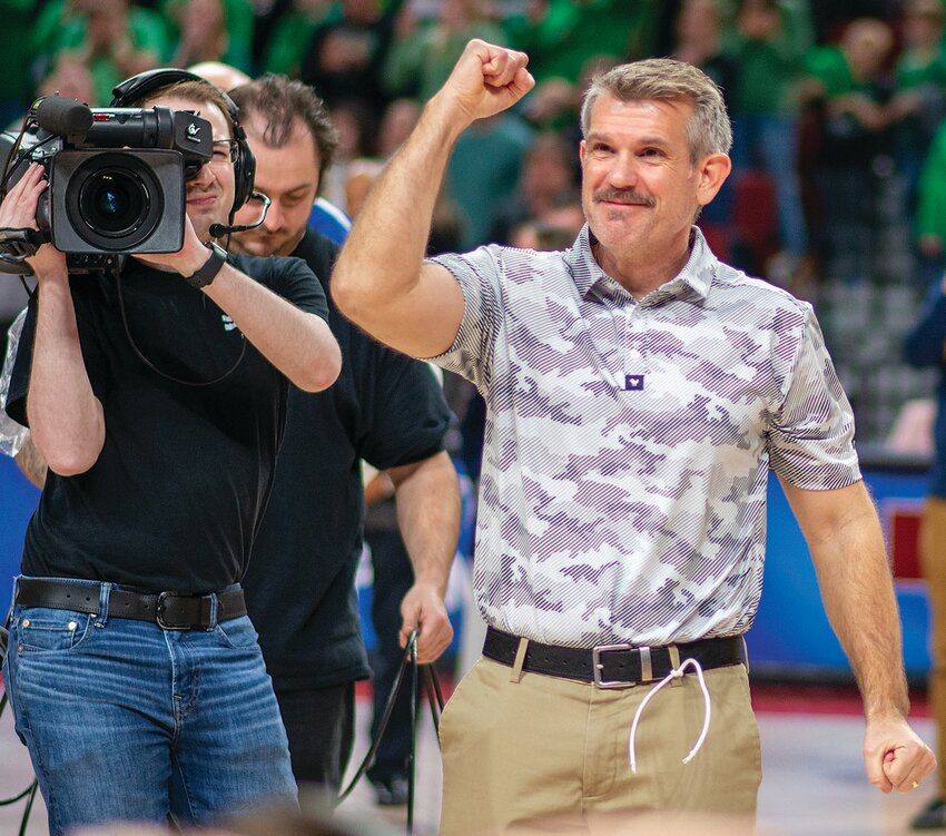 So much emotion can be seen on Oakland-Craig Lady Knights Coach Scott Guzinski immediately following the school's first ever state basketball championship.