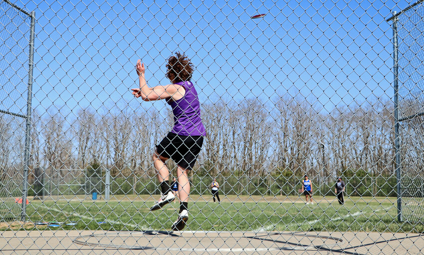 Blair junior Zach Beckner lets an attempt fly Tuesday during the discus event at Plattsmouth High School. The Bear earned second with a 124-foot, 2-inch throw.