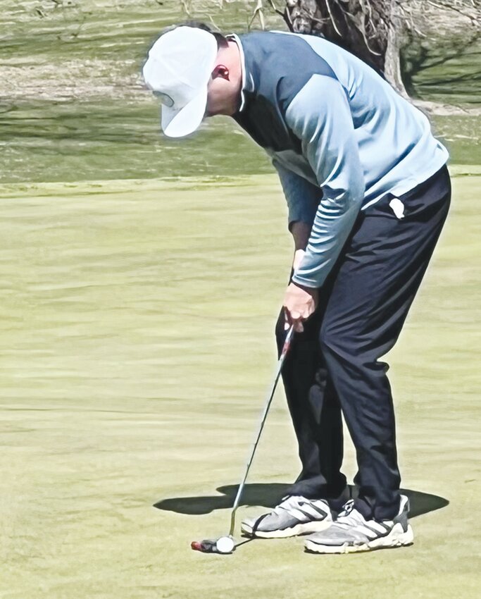 Gavin Hardeman lines up his putt for LDNE at the West Point-Beemer Invite.