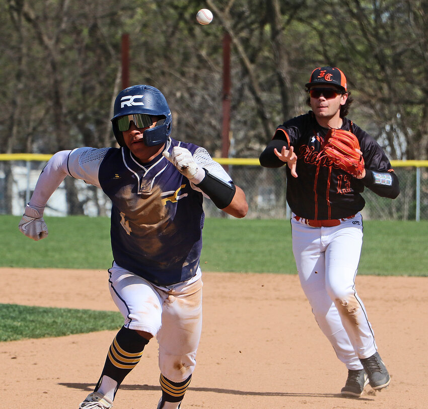 Infielder Charlie Boumstein, right, and the Pioneers get a Raymond Central base runner in a rundown Saturday during the Nebraska Capitol Conference Tournament in Fort Calhoun.