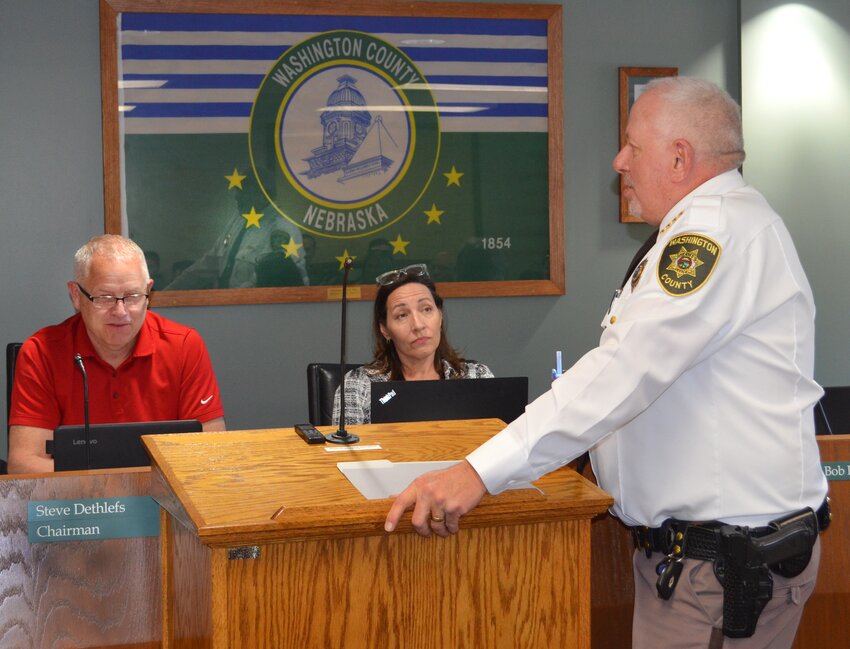 Washington County Board of Supervisors Chair Steve Dethlefs announces the upcoming retirement of Sheriff Mike Robinson at Tuesday's meeting.
