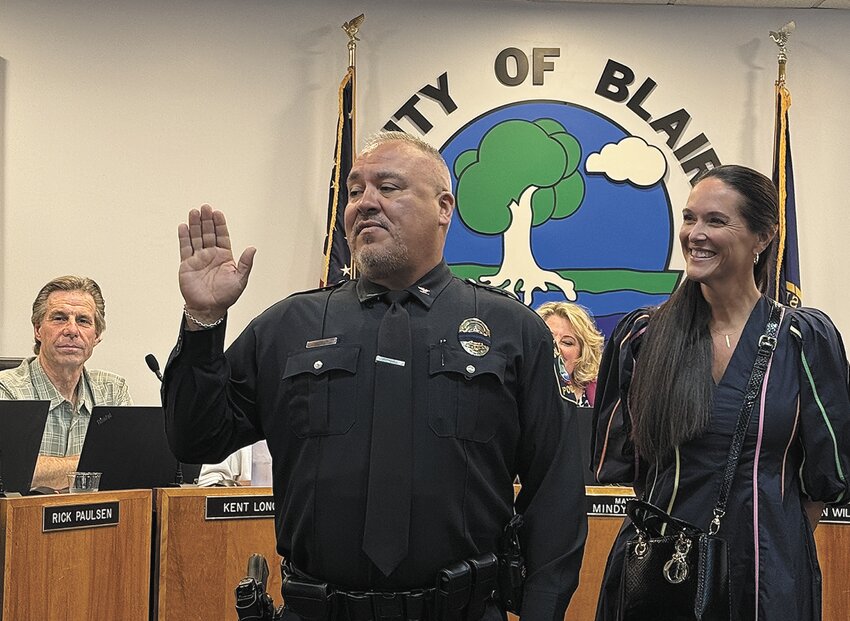 Jeremy Kinsey, the City of Blair's new police chief, was officially sworn in during Tuesday's city council meeting. He is shown with his wife Jennifer.