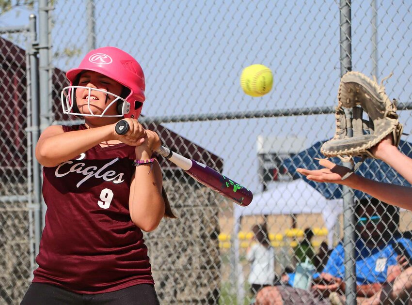 Charlie Bennett of the Arlington Youth Sports age 10 and younger softball team lays off a high pitch Saturday during the Mother's Day Tournament at the RVR Bank Sports Complex.