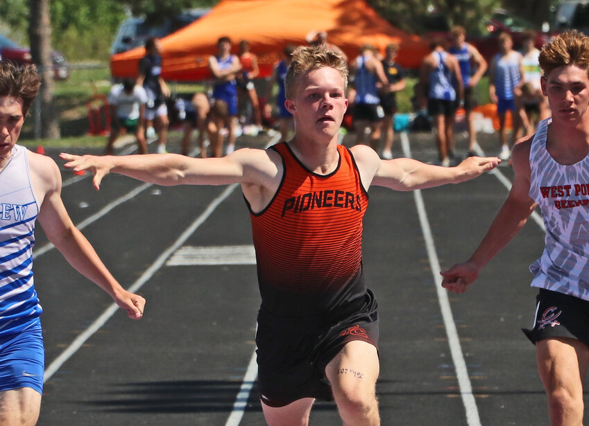Fort Calhoun sprinter Clay Bohnenkamp reaches the finish line of the 100-meter dash prelims Tuesday during the Class B District 3 Meet at Blair High School's Krantz Field.