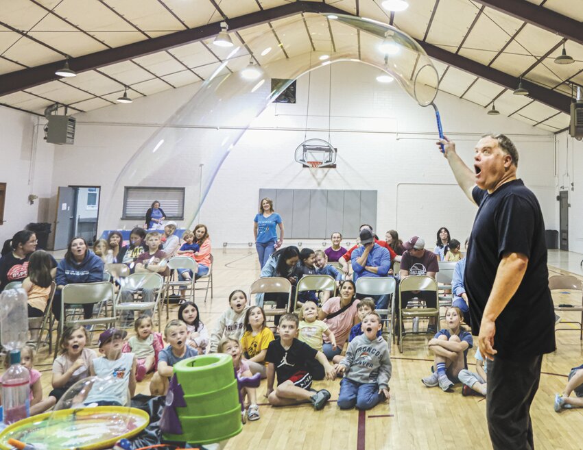 Some just watched while others asked questions during Dr. Oxygen's show that served as the kickoff for Arlington's summer reading program.
