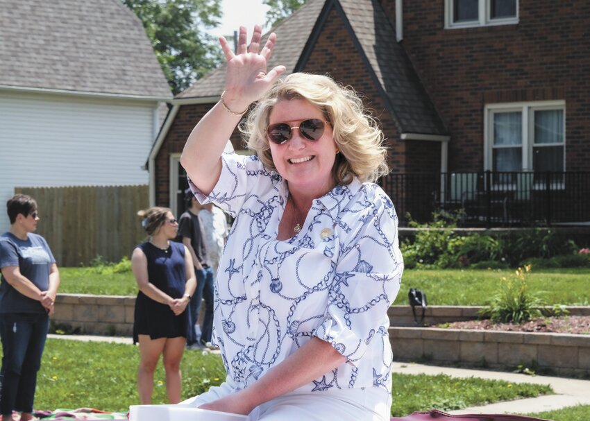 Blair Mayor Mindy Rump waves to spectators during last Saturday's Gateway to the West Days parade.