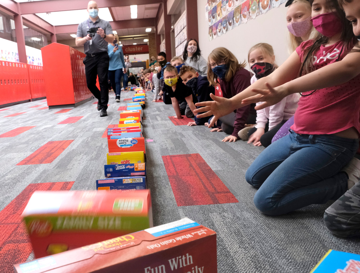 Arbor Park School creates cereal box dominoes before donation ...