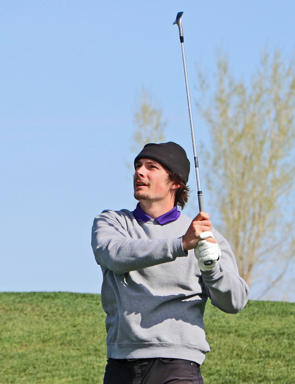 Blair's Bode Soukup watches his shot down the ninth fairway Friday at River Wilds Golf Club.
