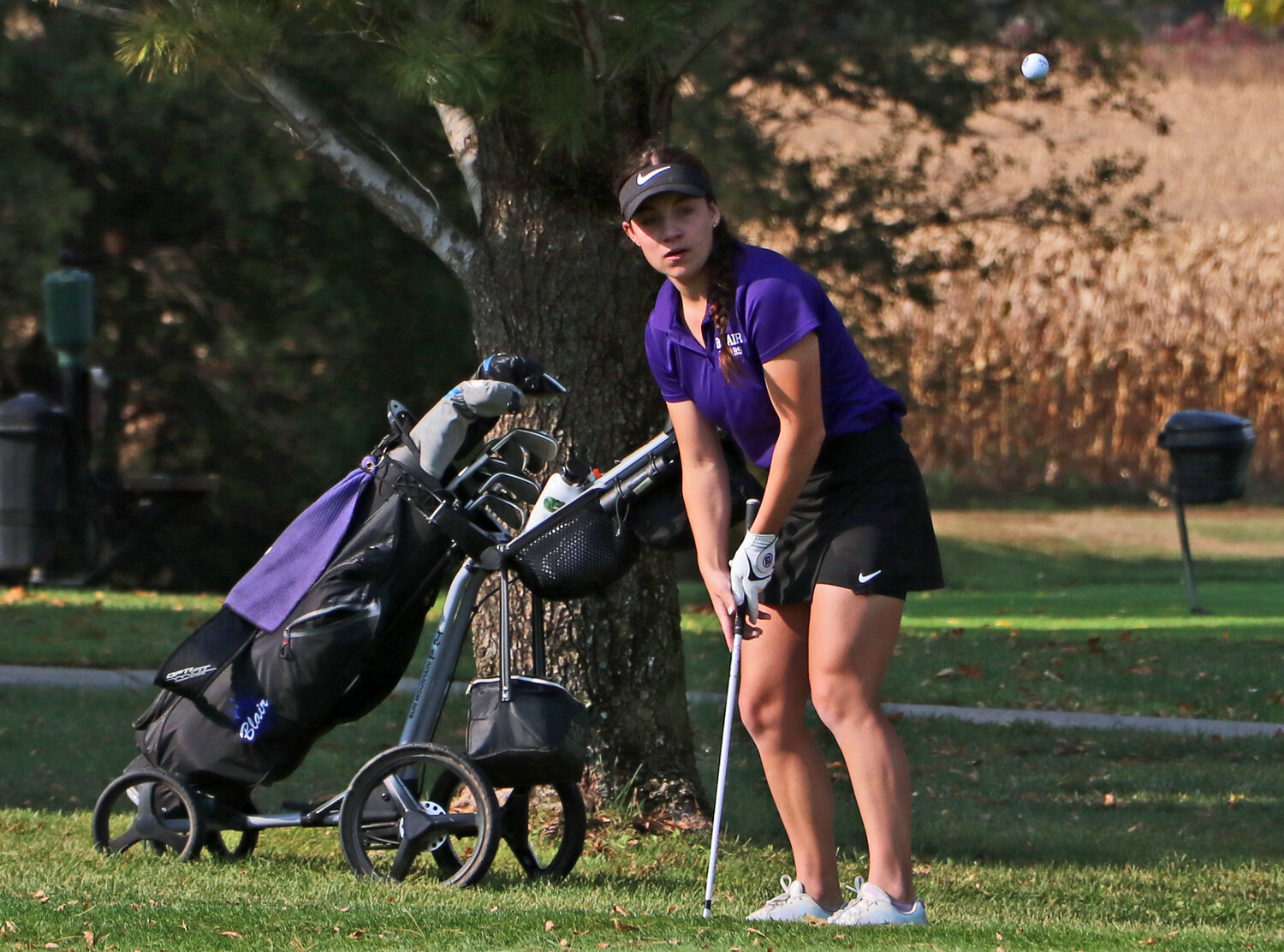 Mackenzie Storjohann chips during the district tourney in York. On Monday and Tuesday, the Blair High School senior competed at the NSAA Class B State Golf Championships in Gering.