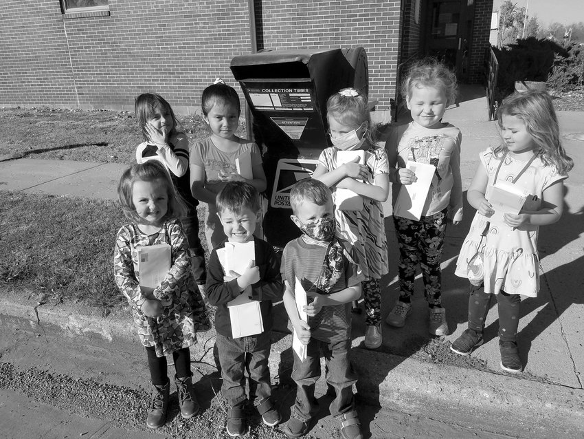 This preschool class took advantage of the nice weather to walk to the post office and mail letters to veterans, inviting them to the school's program Nov. 11. Participants include Lanna Fischback, back left, Sarai Hernandez, Rina Frankfurth, Jessa Hanson, Jordyn Van Diepen; Savannah Driggers, front left, Preston Huls, and Micah Blue.