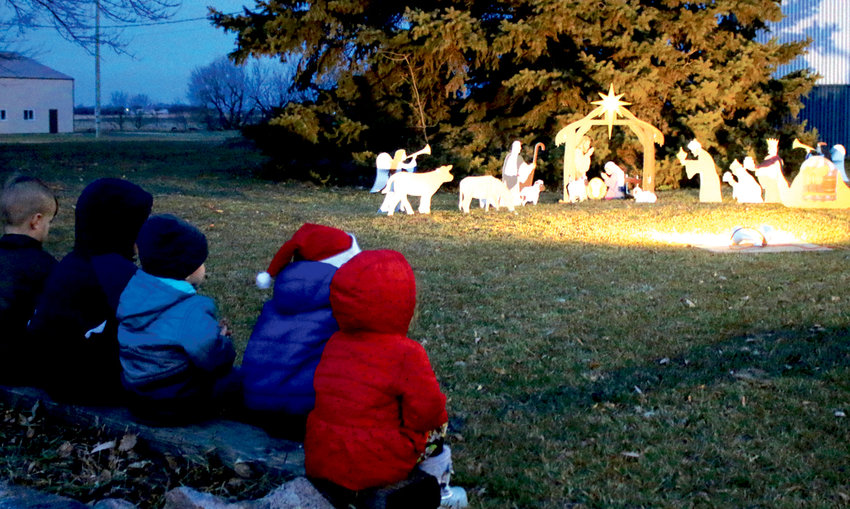 On Sunday evening at sunset in Oldham, residents and children gathered to see the Lighting of the Nativity. The lighting has been a tradition for close to thirty years. Once the Nativity was lit, the crowd sang &ldquo;Away in a Manger&rdquo; and other songs. The group moved to the high school gym and had a barbeque supper, games including BINGO and other Christmas activities.