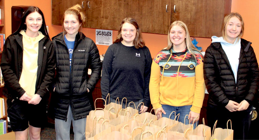 The Iroquois Peer Assistant Team (IPAT) has assembled and delivered fruit bags to 57 community members.&nbsp;The IPAT members understand how difficult these past few years have been and hope to make everyone&rsquo;s day brighter. Pictured are Harley Nelson, left, Katie Dubro, Lily Blue, Kaylee Morehead and Kera Dubro. Advisors for IPAT are Mr. Scott Beehler and Ms. Karen Bohlander.