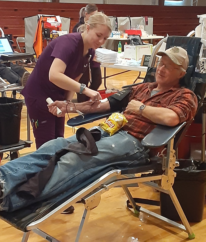 The Oldham American Legion Auxiliary hosted a community blood drive on Mon., March 14 at the Oldham gym. Area resident Alan Boyd is pictured with employees from Vitalant Blood Service. Donations of 33 pints of blood were collected. Students from Oldham-Ramona Honor Society helped with snacks.