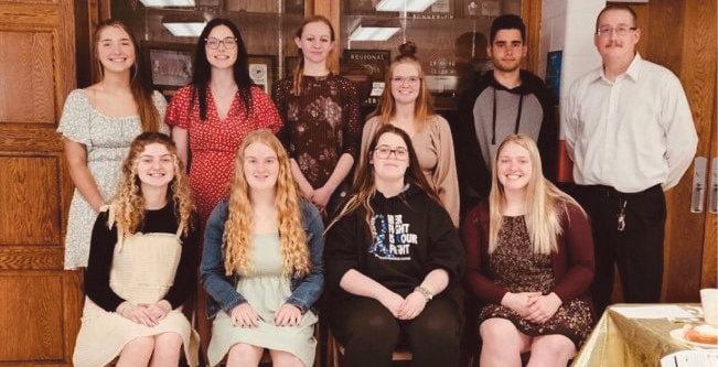 Iroquois High School held a National Honor Society Induction Ceremony, led by present Society members, on April 22, 2022. Congratulations to the inductees Alex Generoso, Kasey Burmeister, Lexi Burma, Anna Decker and Lily Blue.  Pictured are Katie Dubro, back left, Harley Nelson, Samantha Torguson, Hannah Hofhenke, Alex Generoso and sponsor Dan Kennedy; Anna Decker, front left, Lexi Lee Burma, Kasey Burmeister, Kaylee Morehead. New inductee Lilly Blue was absent.