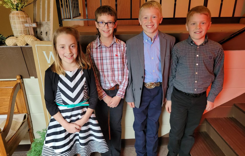 Heidi Carlson, left, Case Carlson, Nolan Eichler and Carson Eichler, all from Lake Preston, competed April 24 at the Junior Piano Festival held in De Smet. They competed in the Duet category.