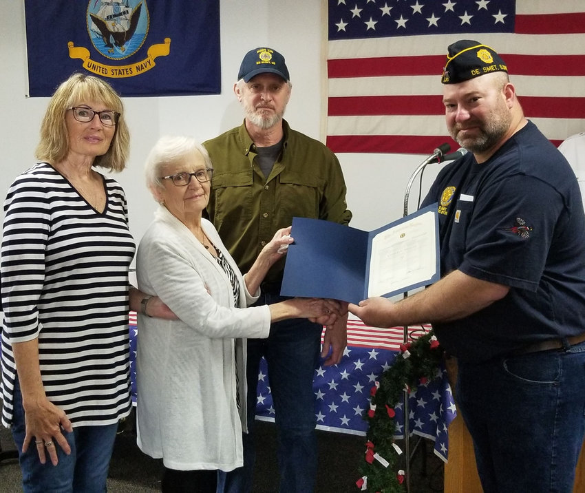 Harvey Hubbard, Commander, presented the family of Craig Munger his 70-year membership certificate.
