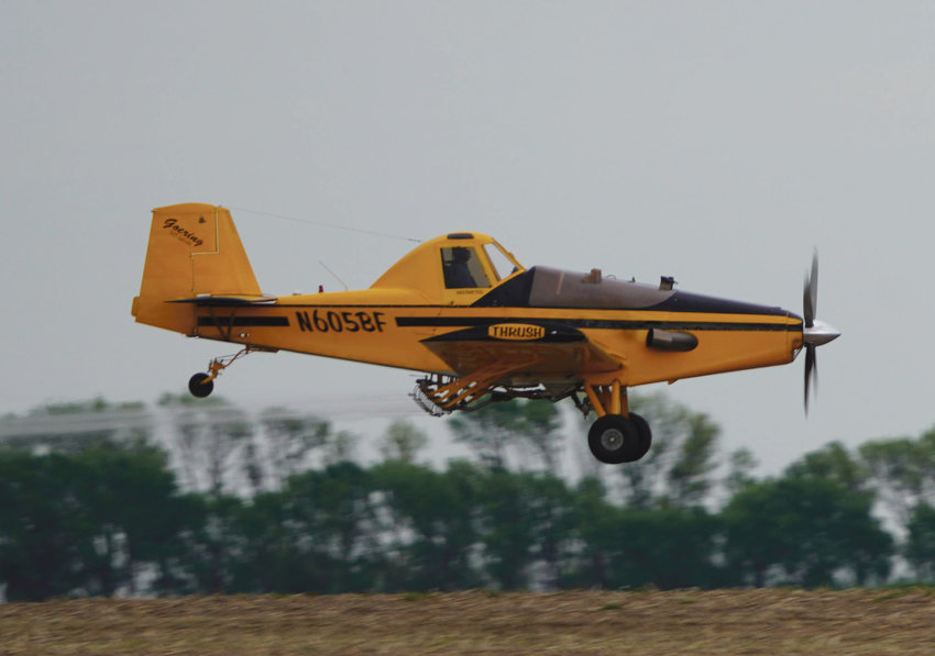 Area farmers have been working around rain to get crops in this spring, and getting a little help from the air.