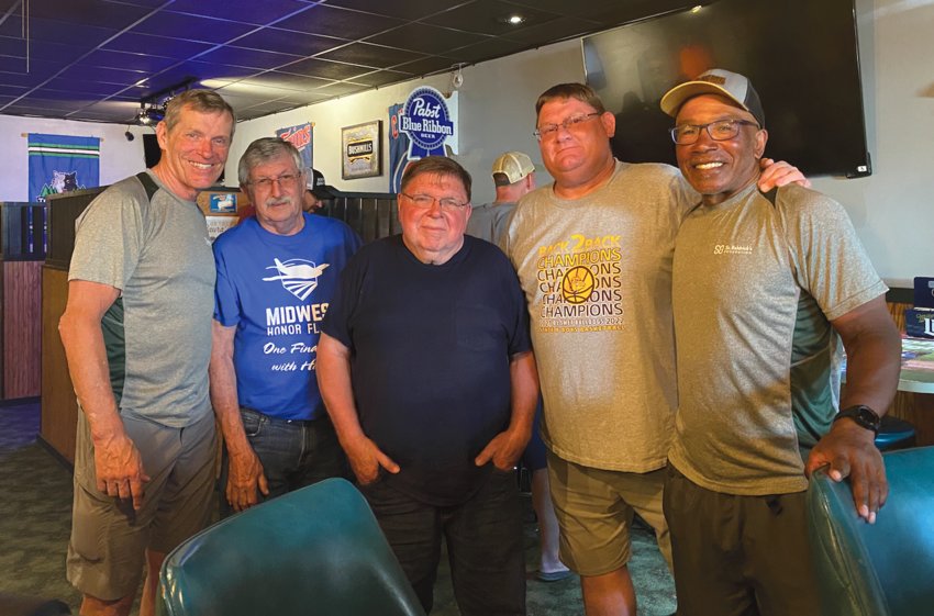 Ray Wittmier, left, Gary Wolkow, Steve Siver, George Cavanaugh and Gene Woodard began talking in Klinkell&rsquo;s on Saturday night. Wittmier and Woodard began a 50-day, 13 state, 3,100 mile bike ride across the United States to raise money for their honorary niece, Maya, who is undergoing cancer. They have successfully raised over $12,000. The original goal when they started this was $7,000. They began their journey on May 20 in Seattle and plan to end up in New York. People are welcome to find them on Facebook or their website to track the journey, to learn more or to donate. https://www.stbaldricks.org/fundraisers/cyclingforMaya.