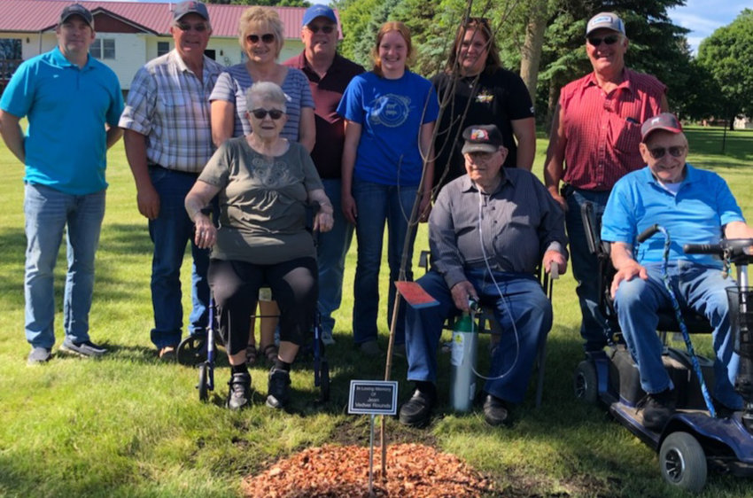 Andy Wienk, Lake Preston Mayor, back left; Al and Deb Vedvei, Jean&rsquo;s brother and sister-in-law; Jon Vedvei, Jean&rsquo;s brother; Hadlee Holt, Jean&rsquo;s great-niece; Corrie Walter, Jeans niece; Charlie Vedvei, Jean&rsquo;s brother. Helen Vedvei, Jean's mom, front left; Vernon Vedvei, Jean&rsquo;s uncle; Alec Vedvei, Jean&rsquo;s dad.