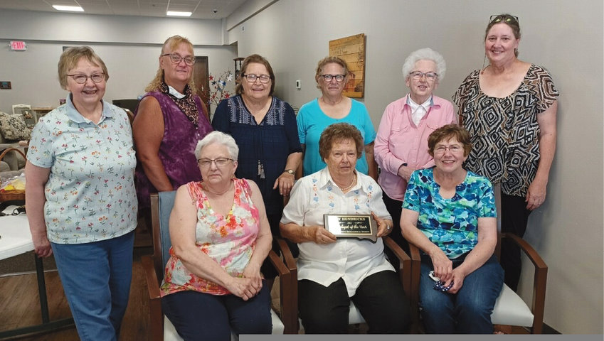 On July 12, 2022, at The Village Assisted Living in De Smet, the Kingsbury Genealogical Society presented Kay Hendricks with a plaque for being chosen 2022 Genealogist of the Year. Members pictured are Jane Pierce, back left, Sharon Geyer, Nancy Anderson, Kathy Connell, DeDe Kruger, Vanessa Hoyer; Pat Tvinnereim, front left, Kay Hendricks and Peggy Nelson.