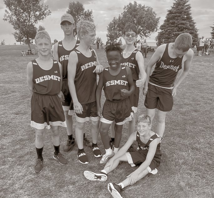 Some boys from the De Smet XC team get the giggles before their meet.