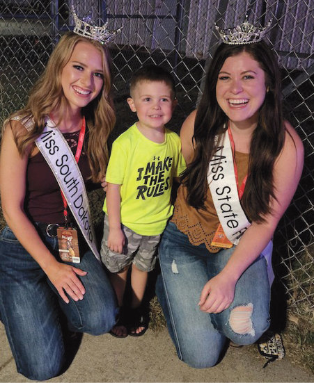 Three-year-old Landen Warner had the privilege of meeting 2022 Miss South Dakota Hunter Widvey, left, and 2022 Miss South Dakota State Fair Miranda O&rsquo;Bryan, right, at the South Dakota State Fair. Both young women were so kind to him, and to say he was excited to meet &ldquo;real life princesses&rdquo; is an understatement.