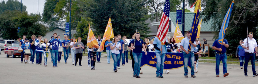 The Lake Preston Homecoming Parade was held on Friday with the flags and marching band leading the pack.
