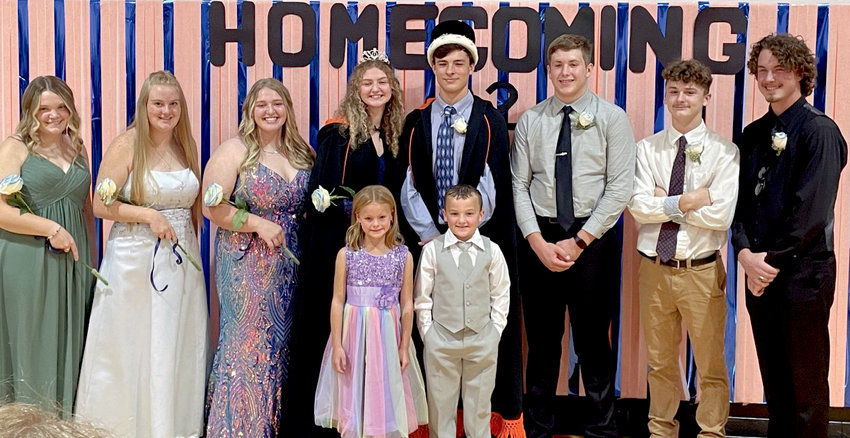 Coronation was Monday night for Iroquois High School. Lily Blue, back left, Lexi Burma, Kaylee Morehead, Queen Anna Decker, King Toby Arbeiter, Logan Peskey, Braxton Stroud and Logan Pekron. Front row gift bearers: Rina Frankfurth and Wesley Rowcliffe.