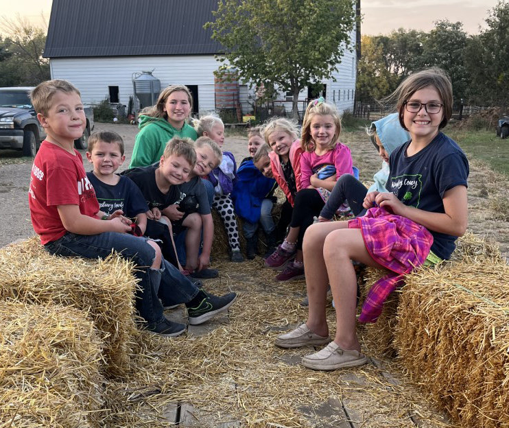 To kick off 4-H week, the Hartland 4-Hers had a meeting and a hay ride. Pictured are Eli McCloud, left, Creole McCloud, Tristan Boldt, Huxley McCloud, Brityn Davies, Lyndi McCloud, Arya Boldt, Hayes Boldt, Evelyn Belden, Kennedi Boldt, McKinley Boldt and Mya McCloud.