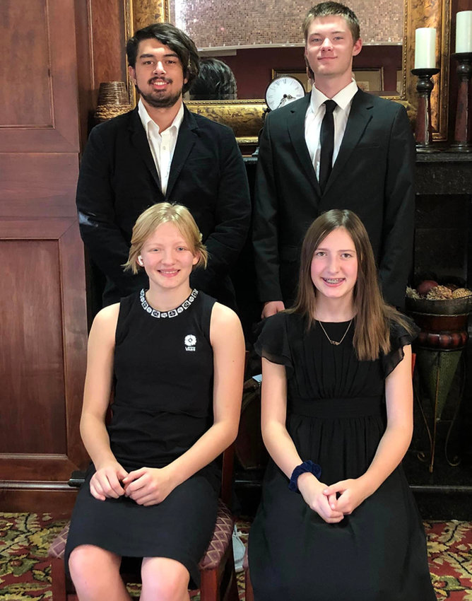 Lake Preston students Garrett Kruger, back left, and AJ Wienk and Amelia Halland, front left, Josslyn O&rsquo;Dea participated in All-State Chorus.