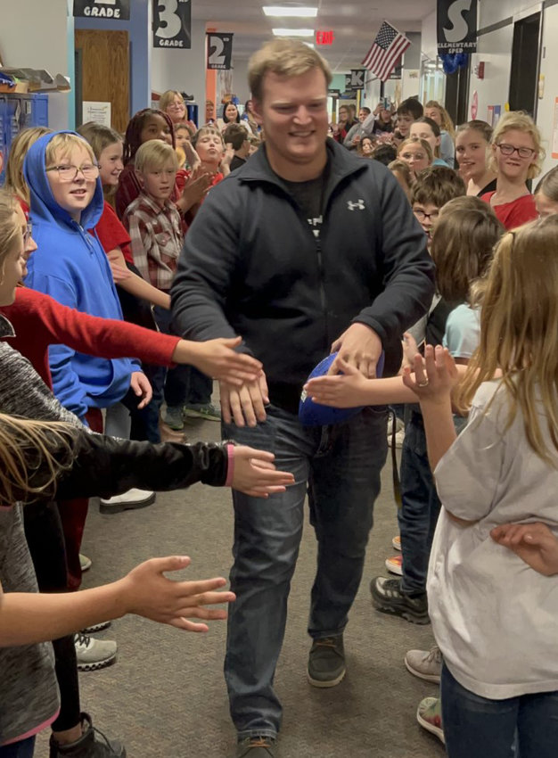 Nathan McKee, fourth-grade student teacher at Iroquois Elementary School, enjoyed a high five from all the students who lined up on his last day as he left the building. He always played ball with the children at recess, connecting with them all.&nbsp;McKee was also an assistant football coach for the Iroquois/Lake Preston Sharks. McKee will be graduating from Dakota Wesleyan in December of 2022 with a degree in elementary education.