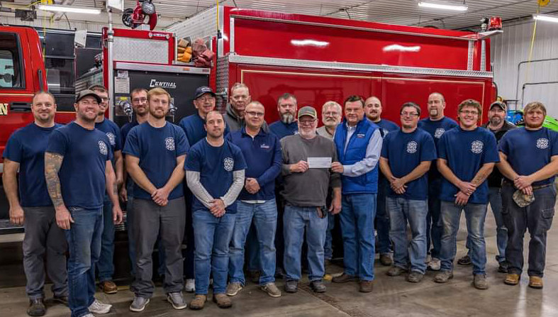 Gene Loos and Scott Korsten with SD Salutes gave the Lake Preston Fire Department a check for $5,000 at their meeting last week.