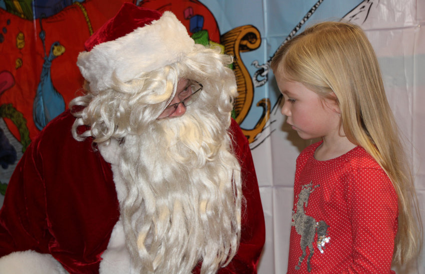 Elizabeth Griffith and Santa have a serious conversation.
