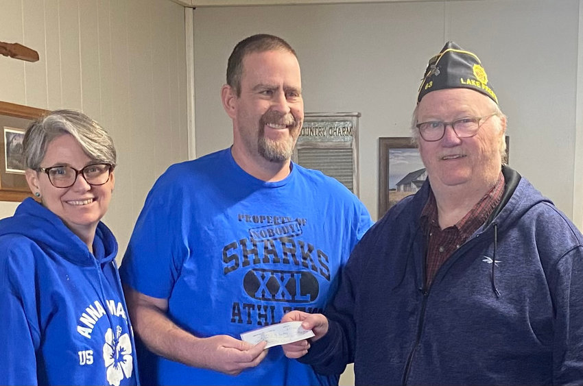 Post Cmdr. Blaine Miller of Porter L. Rich American Legion Post 63 presents a donation to Past Post Cmdr. Sherry McMasters and her husband Jon McMasters to help with medical expenses and travel for therapy. #McMastersStrong