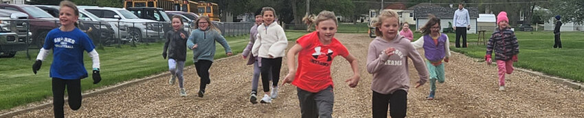 Kindergarten and first-grade girls competed in the 50m dash at Elementary Track and Field Day on Friday. Freshmen, as part of a semester test for health and fitness class, organized the meet for the elementary students.