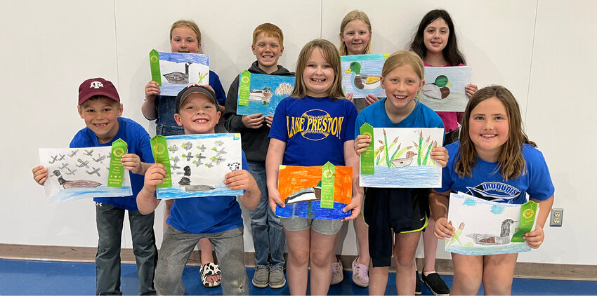 Lake Preston School students receive Honorable Mention Awards in the 2023 S.D. 2023 SD Junior Duck Stamp Competition. Cambree Holt, back left, Carson Eichler, Kassidy Hesse, Rielle Rendon; Weston Eichler, front left, Eli McCloud, Charli McDaniel, Joslyn Blachford, Madi Casper. Others receiving this award are Bergen Woodcock, Kirsten Long and Jossalyn O&rsquo;Dea.