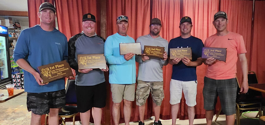 Tanner Thompson-Moad, left, and Brady Will got first place; Mark Sjolie and Ryan Sauter got second and Brian Schwarten and Adam Doerr got third place in the annual Lake Thompson fishing tournament put on by the Lake Preston Chamber-4 Lakes Forward.