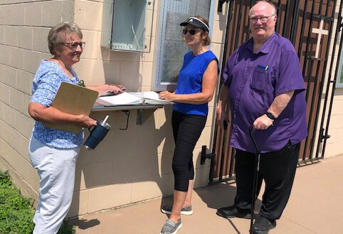 From left to right, volunteers Rose Tolzin, Mary Hauck and Blaine Miller check out the new directory for public use at the Lake Preston Cemetery. The directory provides information about each of the more than 2,000 people buried in the cemetery, including the location of their headstones or markers.