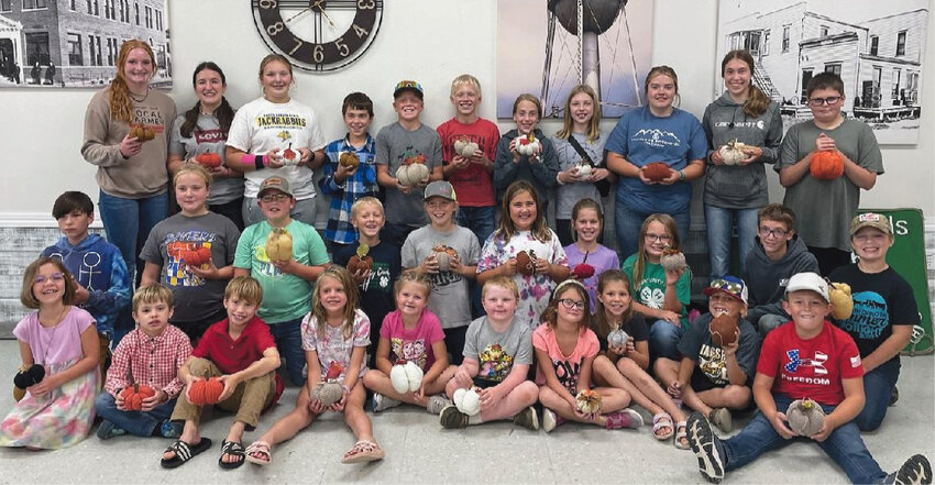 The Busy Blue Bells 4-H Club met Sunday. The club discussed plans for 4-H week and made pumpkins out of old sweaters for a club project.