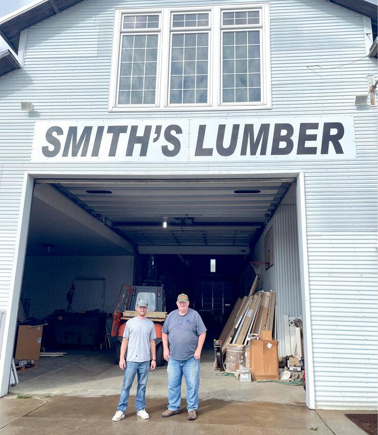 Brady Anderson (L) and his wife Rachel have purchased Smith&rsquo;s Lumber from Al Smith (R) and his wife Heidi and will be changing the name to Anderson Lumber.