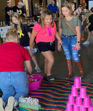 There were lots of games to be played and fun to be had at the Kingsbury County Cancer Walk on Sunday. Madi Casper, left, and Aubrey Exey had fun playing games at the Iroquois HOSA/The County-Line Crew&rsquo;s team camp.