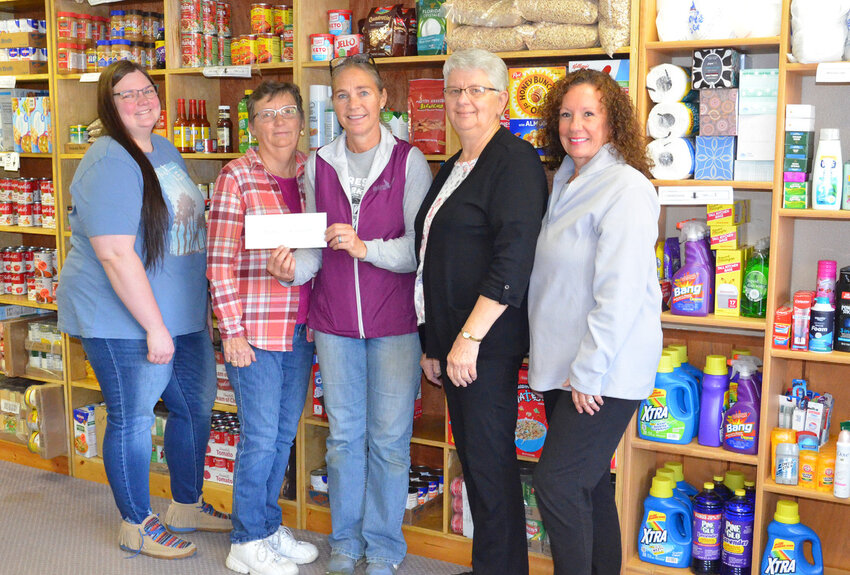After weeks of collecting clothing donations, the Kingsbury County Food Pantry received a check for $3,089, which exceeded the goal. Pictured is Kenna Hojer, who came up with the idea for the clothing drive, presenting the check to Helen Janish, Lynn Beck, Glenda Haines and Lorinda Anderson. Not pictured is Robyn Flickinger, Food Pantry Coordinator, Carolee Penner and Marlene Somsen.