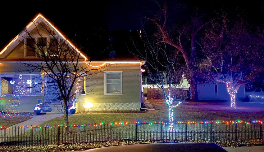 Lake Preston Chamber/4 Lakes Forward and Otter Tail Power Company announce the week one winner in the Christmas Lighting Contest. Terry and Shelly DeKnikker at 300 Walter Ave N., will receive $25 in Chamber Bucks. Otter Tail Power Company sponsors this event every year in December.