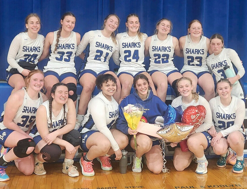 The Iroquois/Lake Preston girls basketball team honored Elena Campagnolo during the home game against Castlewood. This was the last game Campagnolo played before returning home to Italy.