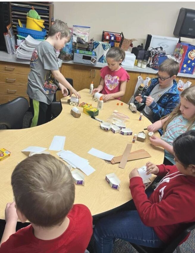 The Iroquois second grade class made autograph books, covered wagons and churned their own butter to celebrate Laura Ingalls Wilder&rsquo;s birthday. They even got to taste their butter on crackers and Mrs. Wienbar taught them how to crochet.