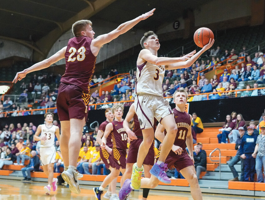 De Smet's Tom Aughenbaugh slices through the Deubrook defense in the Region 2B SoDak 16 qualifer game Friday night at the Huron Arena. The Bulldogs posted wins versus Arlington, Deubrook and Timber Lake over the last week to advance to their sixth straight State B tournament.