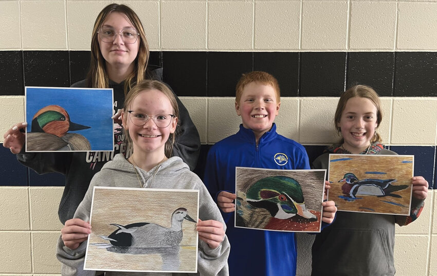 These students placed in the top three in their respective age groups of the South Dakota Junior Duck Stamp Contest: Dani Kruger, left, Lisbeth McGehee, Nolan Eichler and Heidi Carlson. Their art will be traveling around the state of South Dakota this summer.