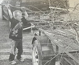 TEN YEARS AGO: Young Kade Hauck helped the community Monday by working with his dad Ben Hauck during spring cleanup. Armed with his own gloves, featuring characters from the movie &ldquo;Cars,&rdquo; Kade helped load a trailer with tree branches.