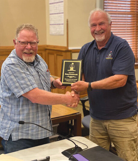 Chairman Kyle Lee presented Doug Kazmerzak with a plaque for his service on the Kingsbury County Board of Commissioners after Kazmerzak announced his resignation during the commissioner meeting on May 7.