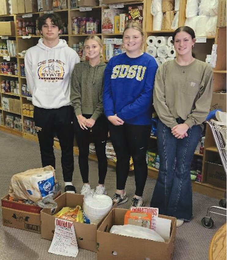 The De Smet High School service learning class dropped off collected donations to the food pantry on Thurs., May 16. The class also volunteered at the pantry on Tuesdays for the past couple of months. Melville Deloye, left, Aubree Blue, Audi Currier and Kody Rowcliffe. Not pictured: Sophia Barr, Cody Zell, Gannon Gilligan and Logan Nielsen.